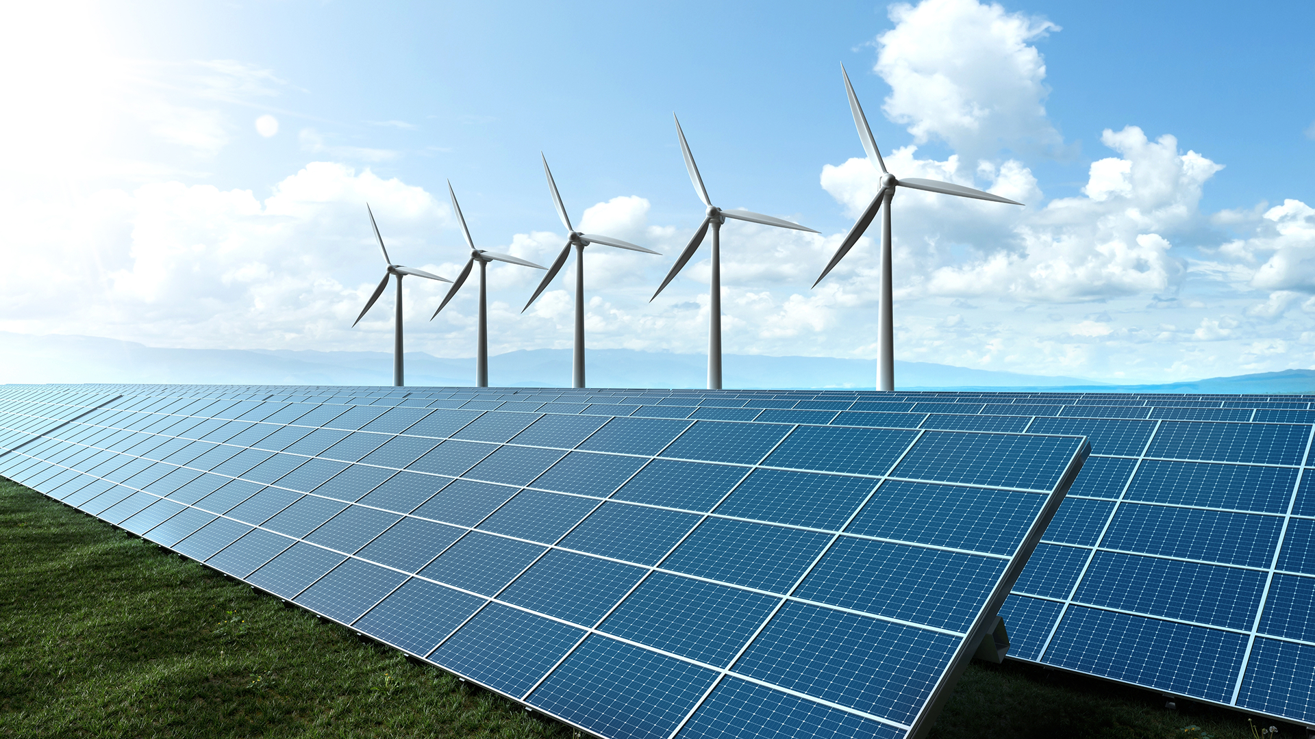 Suzlon wind turbine nacelle aerial view over green fields