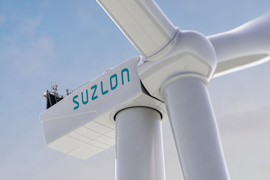 Wind turbine against blue sky